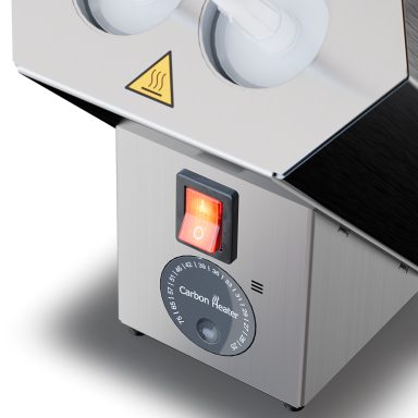 Detailansicht Kartuschenvorwärmgerät mit Hauptschalter und Temperaturregler für 25–75 °C.